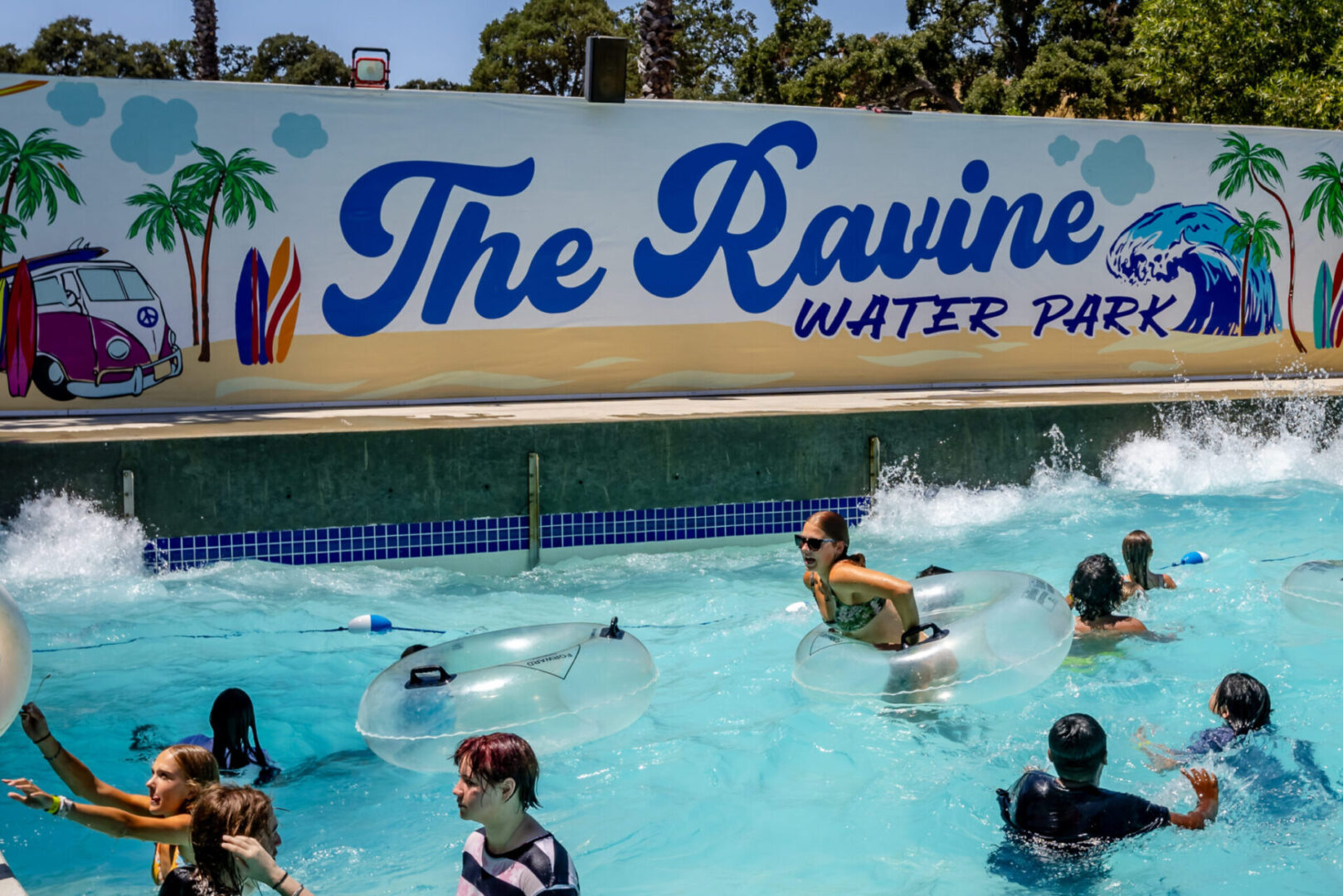 People enjoying water rides at park