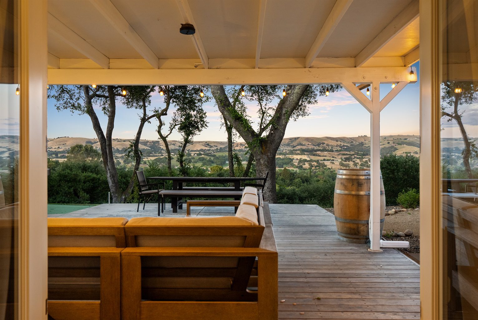 Outdoor patio with scenic countryside view.
