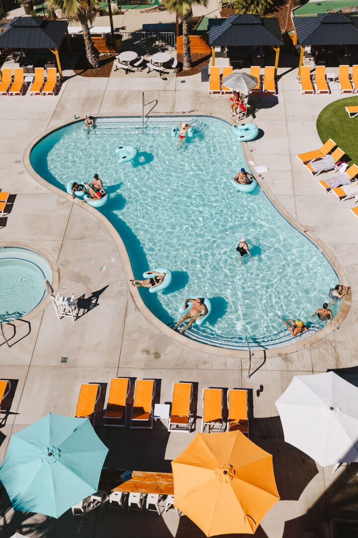 Aerial view of outdoor swimming pool scene.